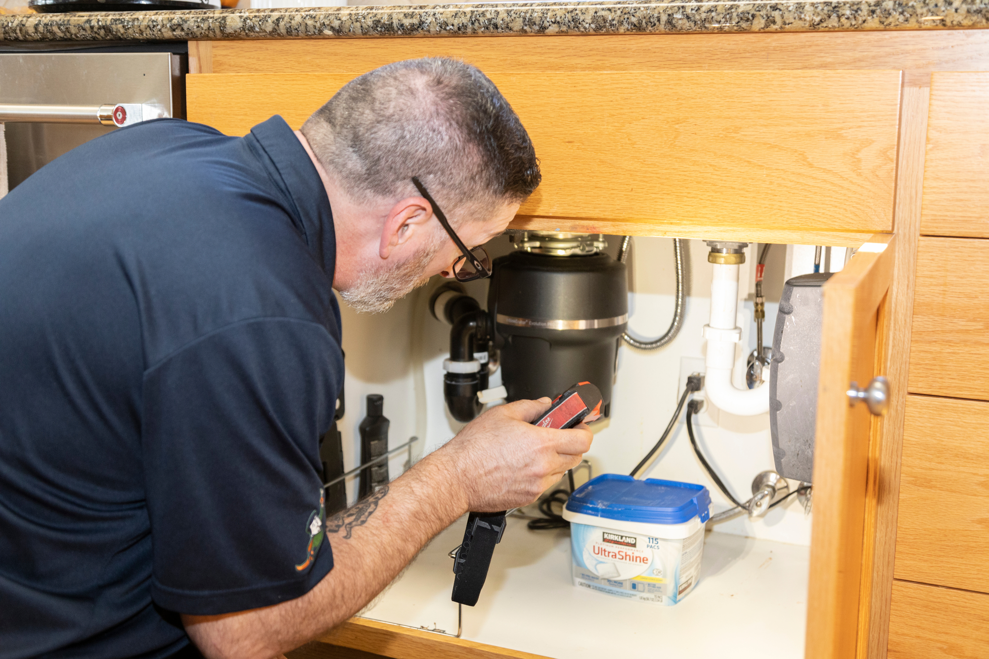 plumber looking for a water leak